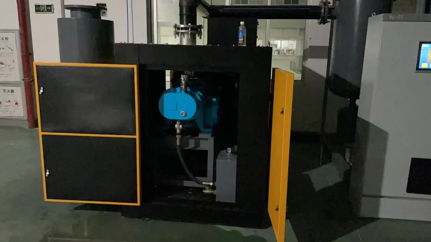 Open equipment view of the TF105 dry screw vacuum pump system during on-site review
