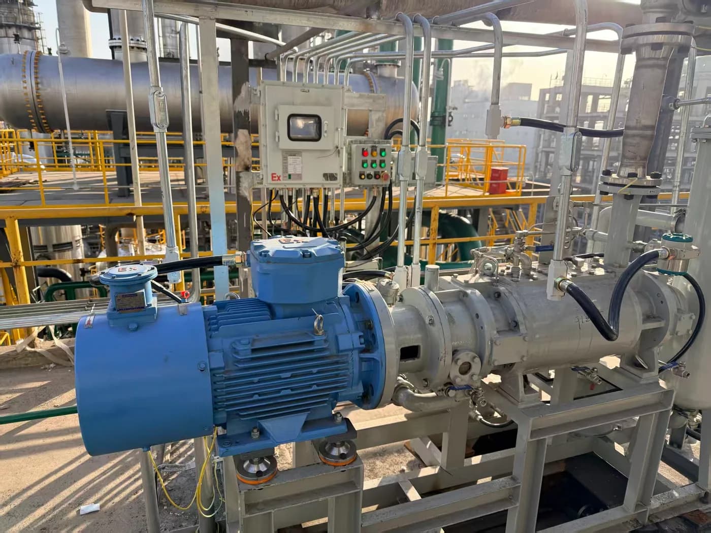 Dry screw vacuum pump installed at a coal chemical site in Shanxi with process piping and control equipment