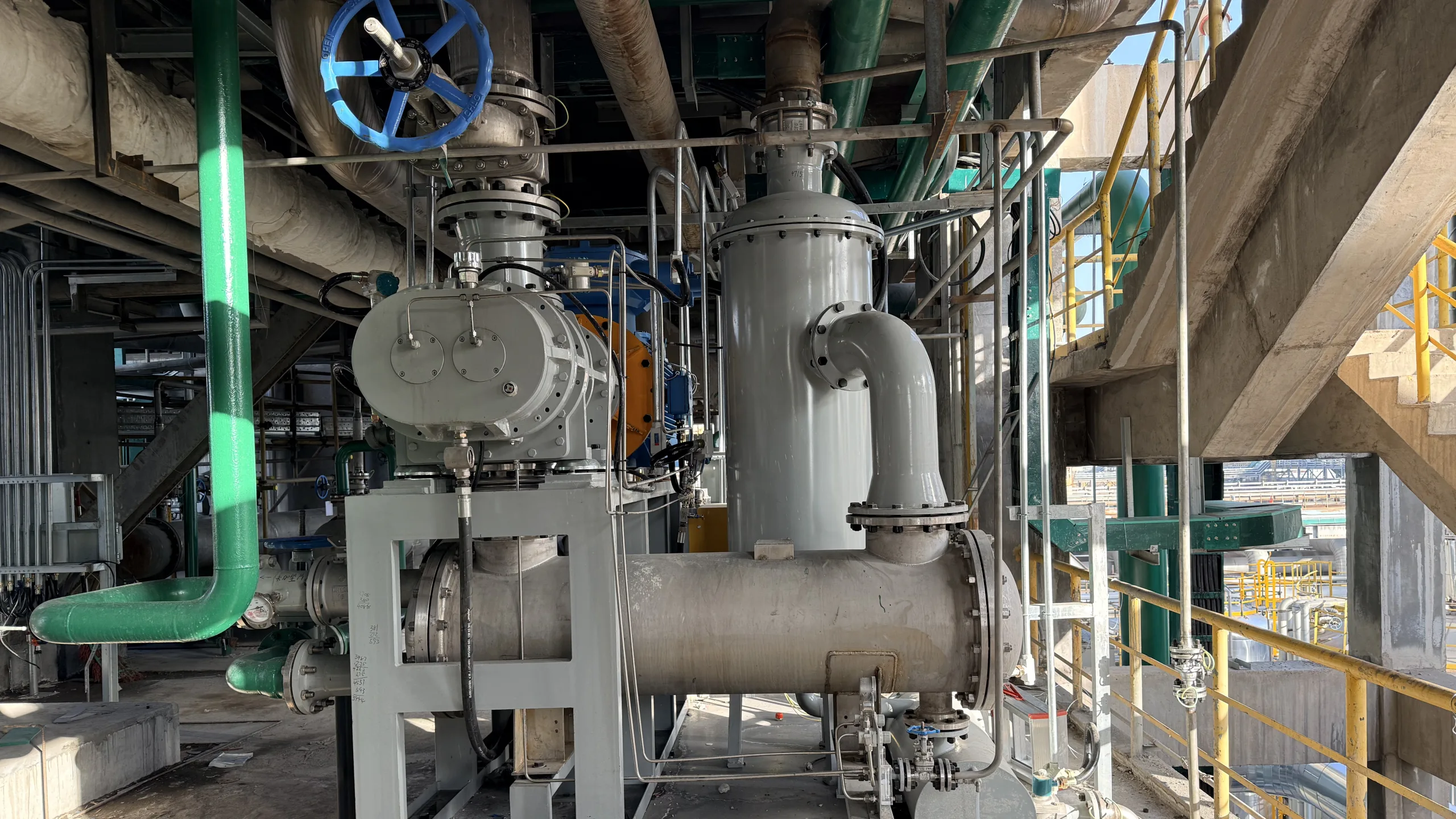 Vacuum pump operating at a customer site with corrosive gas; the project reference in this guide is anonymized.